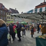 Imkerei Reinhold Burger / Ilona Munique (Bienen-leben-in-Bamberg.de)am Traditionellen Bamberger Honigmarkt am Faschingsdienstag 2025 / Bienen-leben-in-Bamberg.de